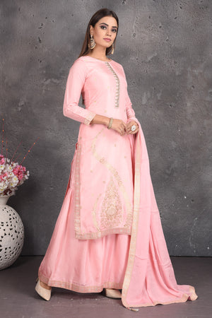 Buy beautiful powder pink embroidered palazzo suit online in USA with dupatta. Set a fashion statement at parties in designer dresses, Anarkali suits, designer lehengas, gowns, Indowestern dresses from Pure Elegance Indian fashion store in USA.-right