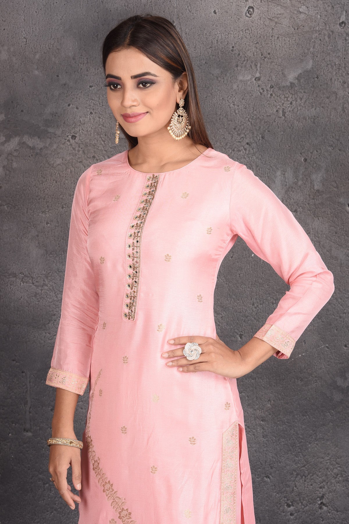 Buy beautiful powder pink embroidered palazzo suit online in USA with dupatta. Set a fashion statement at parties in designer dresses, Anarkali suits, designer lehengas, gowns, Indowestern dresses from Pure Elegance Indian fashion store in USA.-closeup