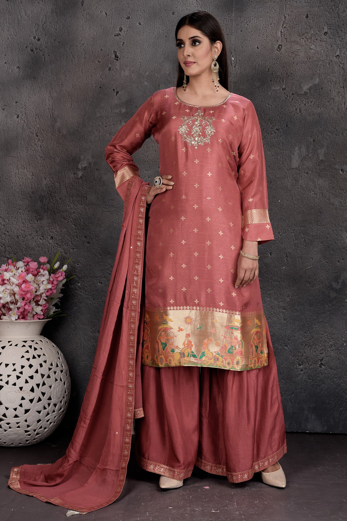 Buy gorgeous blush pink embroidered sharara suit online in USA with dupatta. Set a fashion statement at parties in designer Indian dresses, Anarkali suits, designer lehengas, gowns, Indowestern dresses from Pure Elegance Indian fashion store in USA.-front