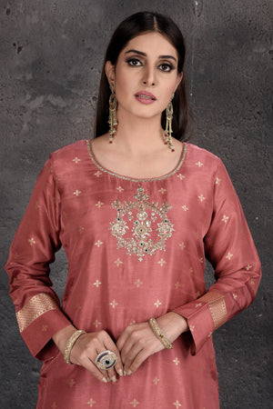 Buy gorgeous blush pink embroidered sharara suit online in USA with dupatta. Set a fashion statement at parties in designer Indian dresses, Anarkali suits, designer lehengas, gowns, Indowestern dresses from Pure Elegance Indian fashion store in USA.-closeup