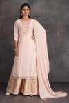 Shop stunning powder pink and golden embroidered palazzo suit online in USA with dupatta. Set a fashion statement at parties in designer dresses, Anarkali suits, designer lehengas, gowns, Indowestern dresses from Pure Elegance Indian fashion store in USA.-full view