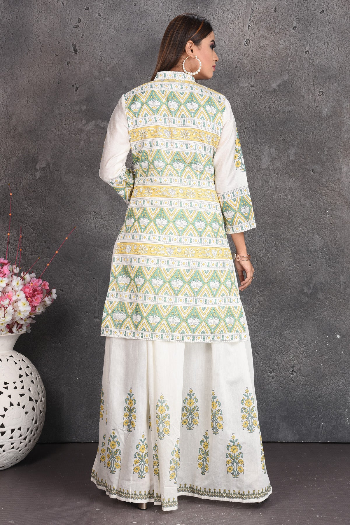 Shop elegant off-white printed skirt set online in USA. Set a fashion statement at parties in designer dresses, Anarkali suits, designer lehengas, gowns, Indowestern dresses from Pure Elegance Indian fashion store in USA.-back