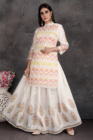 Shop stunning off-white print skirt with kurti online in USA. Set a fashion statement at parties in designer Indian dresses, Anarkali suits, designer lehengas, gowns, Indowestern dresses from Pure Elegance Indian fashion store in USA.-skirt