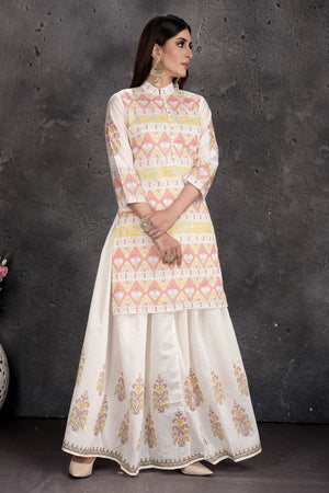 Shop stunning off-white print skirt with kurti online in USA. Set a fashion statement at parties in designer Indian dresses, Anarkali suits, designer lehengas, gowns, Indowestern dresses from Pure Elegance Indian fashion store in USA.-side