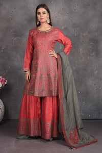 Buy beautiful tomato red embroidered sharara suit online in USA with grey dupatta. Set a fashion statement at parties in designer dresses, Anarkali suits, designer lehengas, gowns, Indowestern dresses from Pure Elegance Indian fashion store in USA.-full view