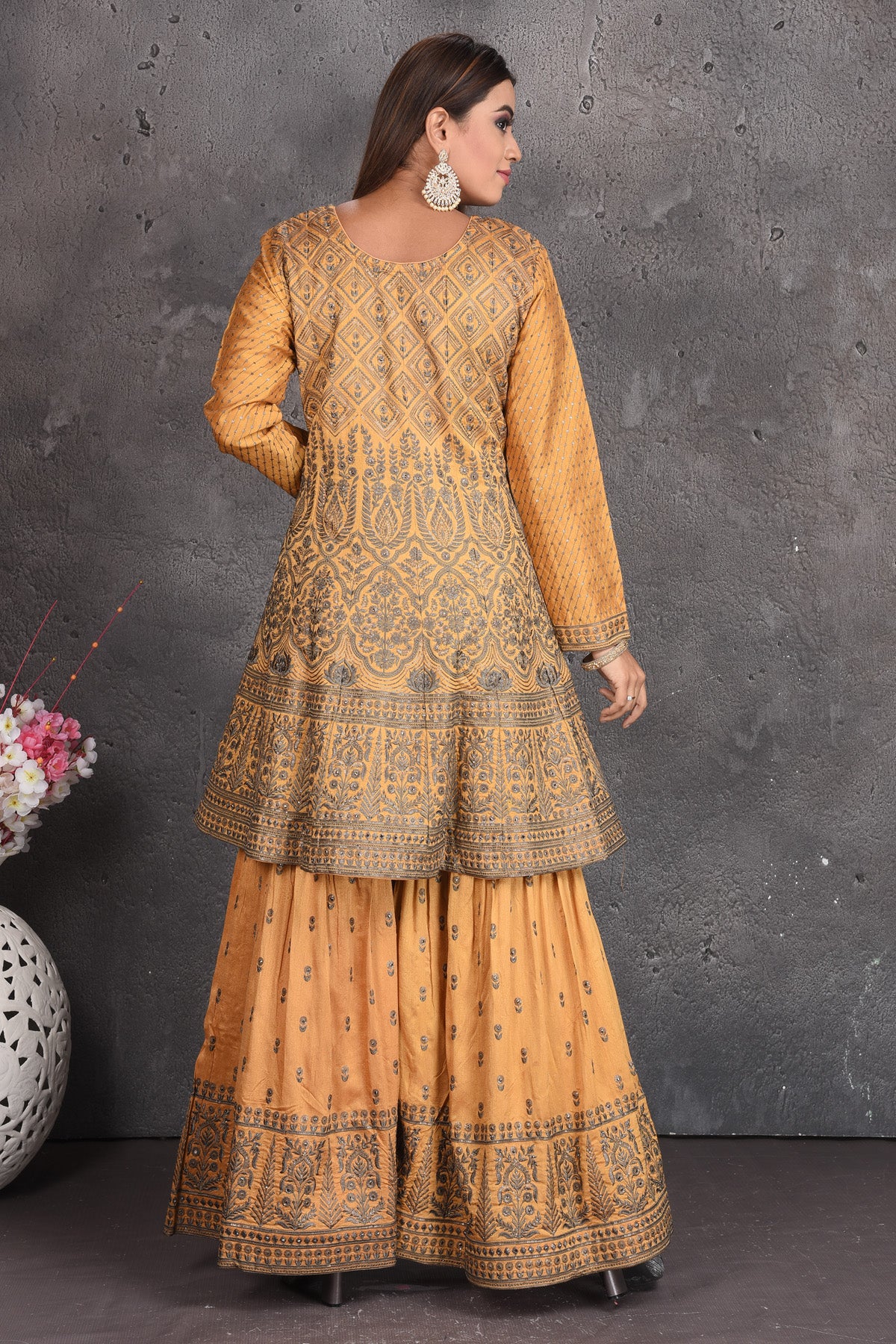 Buy stunning yellow embroidered sharara suit online in USA with grey dupatta. Set a fashion statement at parties in designer dresses, Anarkali suits, designer lehengas, gowns, Indowestern dresses from Pure Elegance Indian fashion store in USA.-back