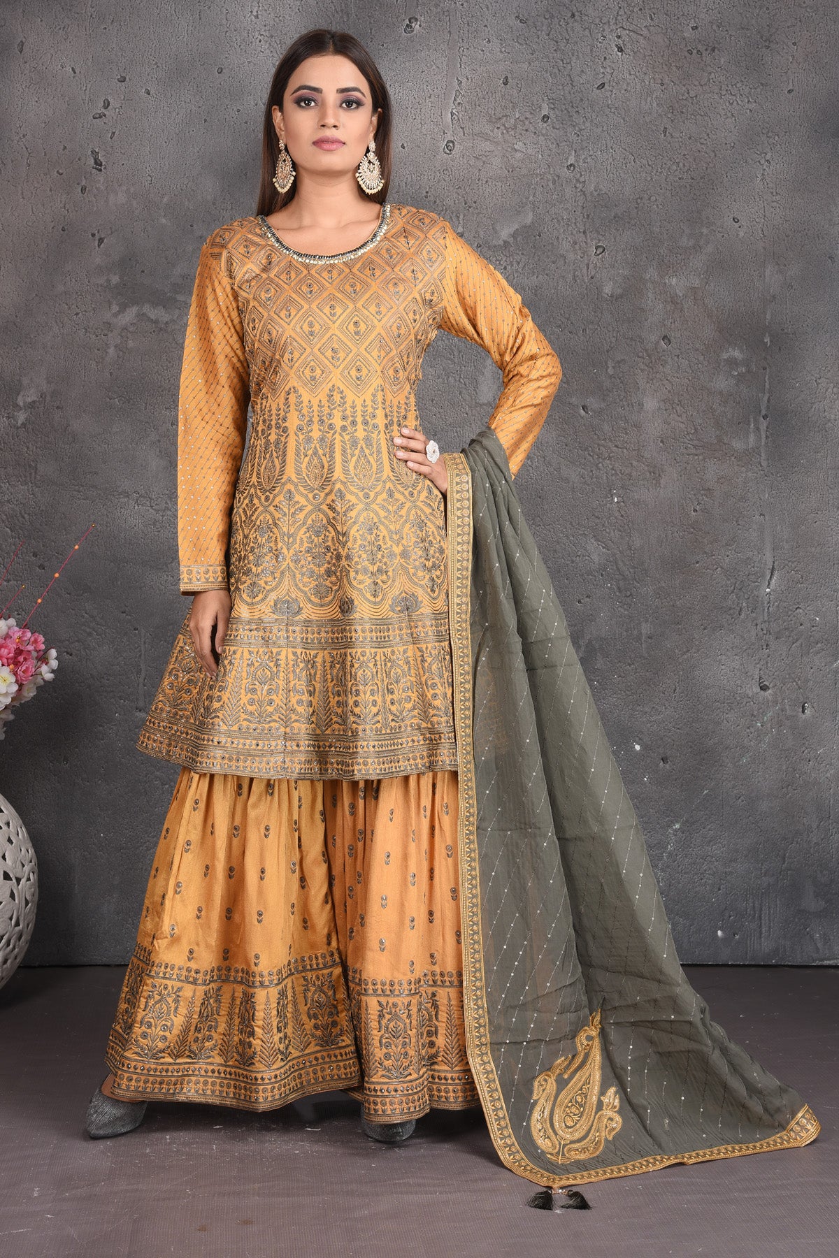 Buy stunning yellow embroidered sharara suit online in USA with grey dupatta. Set a fashion statement at parties in designer dresses, Anarkali suits, designer lehengas, gowns, Indowestern dresses from Pure Elegance Indian fashion store in USA.-full view