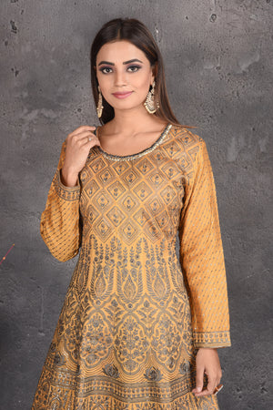 Buy stunning yellow embroidered sharara suit online in USA with grey dupatta. Set a fashion statement at parties in designer dresses, Anarkali suits, designer lehengas, gowns, Indowestern dresses from Pure Elegance Indian fashion store in USA.-closeup