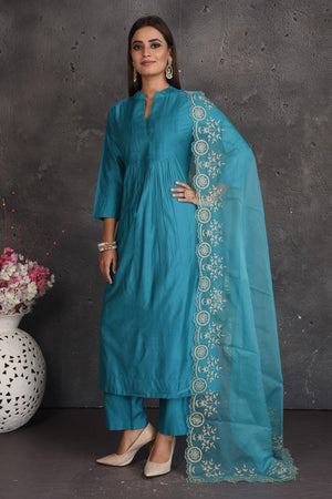 Shop stunning sea blue pant suit online in USA with embroidered dupatta. Set a fashion statement at parties in designer dresses, Anarkali suits, designer lehengas, gowns, Indowestern dresses from Pure Elegance Indian fashion store in USA.-front