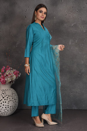 Shop stunning sea blue pant suit online in USA with embroidered dupatta. Set a fashion statement at parties in designer dresses, Anarkali suits, designer lehengas, gowns, Indowestern dresses from Pure Elegance Indian fashion store in USA.-side