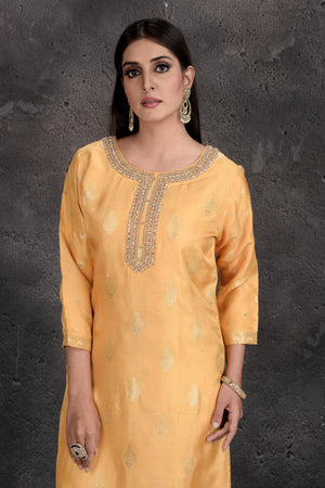 Buy stunning yellow embroidered palazzo suit online in USA with matching dupatta. Set a fashion statement at parties in designer Indian dresses, Anarkali suits, designer lehengas, gowns, Indowestern dresses from Pure Elegance Indian fashion store in USA.-closeup