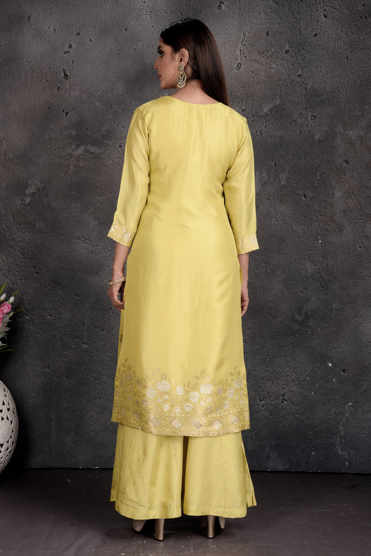 Buy beautiful light yellow embroidered palazzo suit online in USA with dupatta. Set a fashion statement at parties in designer Indian suits, Anarkali suits, designer lehengas, gowns, Indowestern dresses from Pure Elegance Indian fashion store in USA.-back