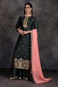 Shop beautiful green designer palazzo suit online in USA with pink dupatta. Set a fashion statement at parties in designer Indian suits, Anarkali suits, designer lehengas, gowns, Indowestern dresses from Pure Elegance Indian fashion store in USA.-full view