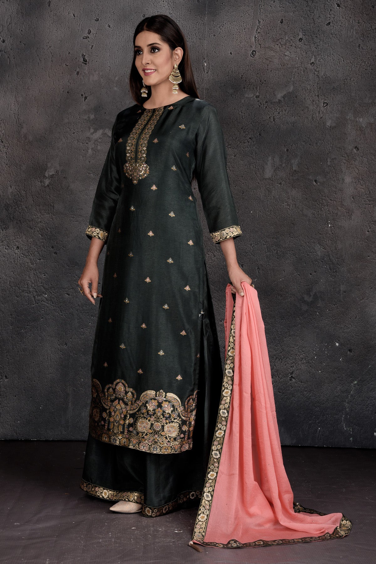 Shop beautiful green designer palazzo suit online in USA with pink dupatta. Set a fashion statement at parties in designer Indian suits, Anarkali suits, designer lehengas, gowns, Indowestern dresses from Pure Elegance Indian fashion store in USA.-side