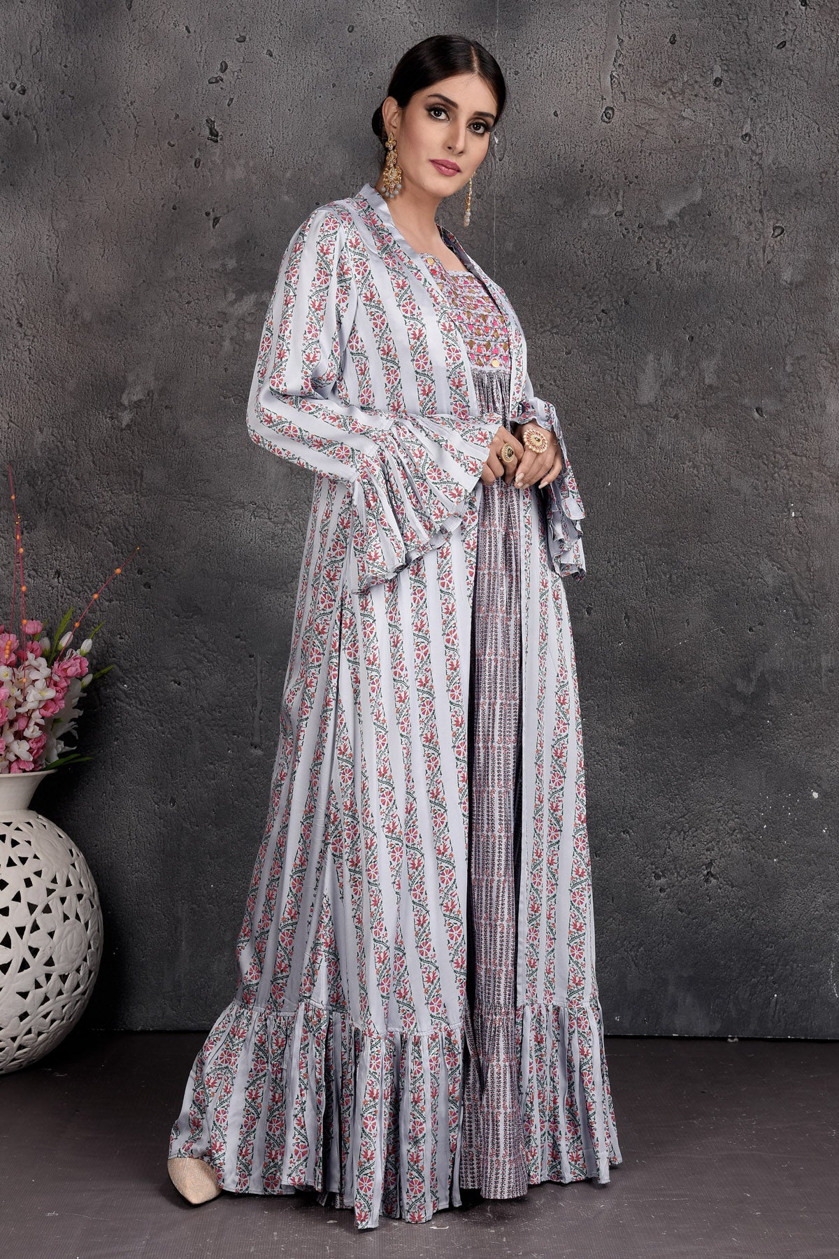 Shop stunning light grey printed maxi dress online in USA with shrug. Set a fashion statement at parties in designer Indian suits, Anarkali suits, designer lehengas, gowns, Indowestern dresses from Pure Elegance Indian fashion store in USA.-right