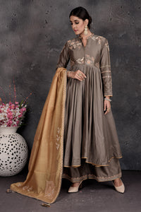 Buy beautiful grey embroidered palazzo suit online in USA with mustard dupatta. Set a fashion statement at parties in designer Indian suits, Anarkali suits, designer lehengas, gowns, Indowestern dresses from Pure Elegance Indian fashion store in USA.-front
