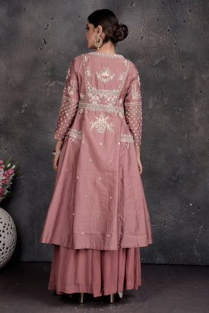 Buy stunning dusty pink embroidered skirt set online in USA with shrug. Set a fashion statement at parties in designer Indian suits, Anarkali suits, designer lehengas, gowns, Indowestern dresses from Pure Elegance Indian fashion store in USA.-back