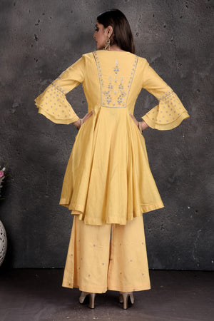 Shop stunning light yellow palazzo suit online in USA with grey dupatta. Set a fashion statement at parties in designer Indian suits, Anarkali suits, designer lehengas, gowns, Indowestern dresses from Pure Elegance Indian fashion store in USA.-back
