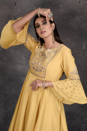 Shop stunning light yellow palazzo suit online in USA with grey dupatta. Set a fashion statement at parties in designer Indian suits, Anarkali suits, designer lehengas, gowns, Indowestern dresses from Pure Elegance Indian fashion store in USA.-closeup