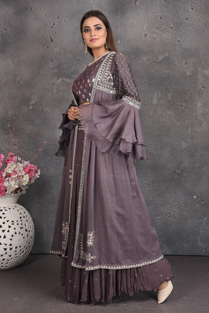 Shop stunning dark grey embroidered crop top skirt online in USA with cape. Set a fashion statement at parties in designer dresses, Anarkali suits, designer lehengas, gowns, Indowestern dresses from Pure Elegance Indian fashion store in USA.-left