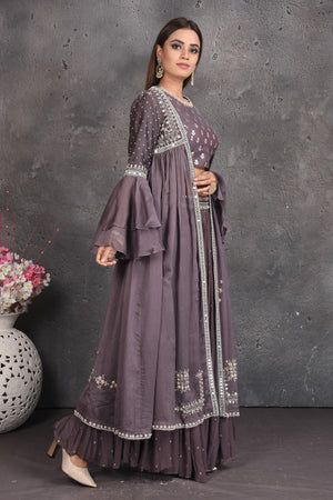 Shop stunning dark grey embroidered crop top skirt online in USA with cape. Set a fashion statement at parties in designer dresses, Anarkali suits, designer lehengas, gowns, Indowestern dresses from Pure Elegance Indian fashion store in USA.-side