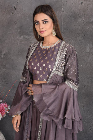 Shop stunning dark grey embroidered crop top skirt online in USA with cape. Set a fashion statement at parties in designer dresses, Anarkali suits, designer lehengas, gowns, Indowestern dresses from Pure Elegance Indian fashion store in USA.-closeup