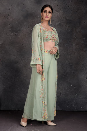 Shop stunning sage green embroidered palazzo and crop top online in USA with shrug. Set a fashion statement at parties in designer Indian suits, Anarkali suits, designer lehengas, gowns, Indowestern dresses from Pure Elegance Indian fashion store in USA.-right