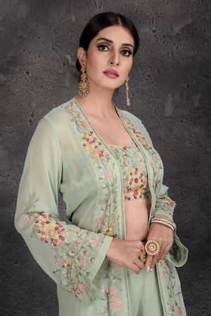 Shop stunning sage green embroidered palazzo and crop top online in USA with shrug. Set a fashion statement at parties in designer Indian suits, Anarkali suits, designer lehengas, gowns, Indowestern dresses from Pure Elegance Indian fashion store in USA.-closeup