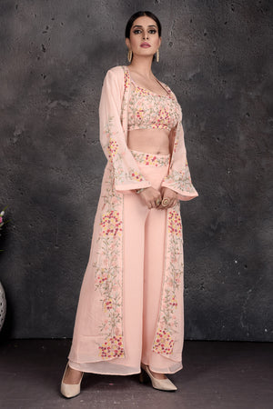 Shop stunning powder pink embroidered palazzo and crop top online in USA with shrug. Set a fashion statement at parties in designer Indian suits, Anarkali suits, designer lehengas, gowns, Indowestern dresses from Pure Elegance Indian fashion store in USA.-side