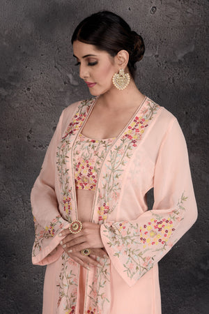 Shop stunning powder pink embroidered palazzo and crop top online in USA with shrug. Set a fashion statement at parties in designer Indian suits, Anarkali suits, designer lehengas, gowns, Indowestern dresses from Pure Elegance Indian fashion store in USA.-closeup