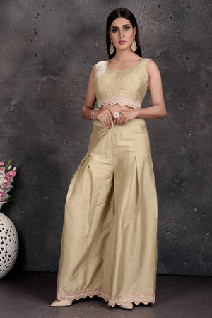 Shop beautiful golden crop top and palazzo online in USA with peach shrug. Set a fashion statement at parties in designer Indian suits, Anarkali suits, designer lehengas, gowns, Indowestern dresses from Pure Elegance Indian fashion store in USA.-front