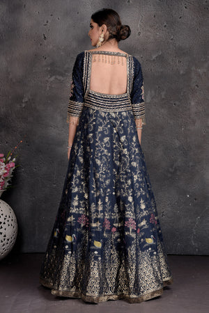 Buy stunning dark blue embroidered Anarkali suit online in USA with pink dupatta. Set a fashion statement at parties in designer Indian suits, Anarkali suits, designer lehengas, gowns, Indowestern dresses from Pure Elegance Indian fashion store in USA.-back