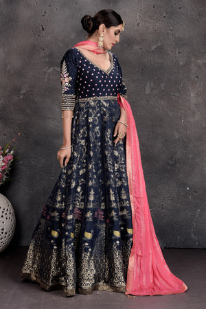 Buy stunning dark blue embroidered Anarkali suit online in USA with pink dupatta. Set a fashion statement at parties in designer Indian suits, Anarkali suits, designer lehengas, gowns, Indowestern dresses from Pure Elegance Indian fashion store in USA.-right