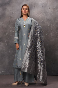 Shop stunning grey palazzo suit online in USA with matching dupatta. Get set for weddings and festive occasions in exclusive designer Anarkali suits, wedding gown, salwar suits, gharara suits, Indowestern dresses from Pure Elegance Indian fashion store in USA.-full view