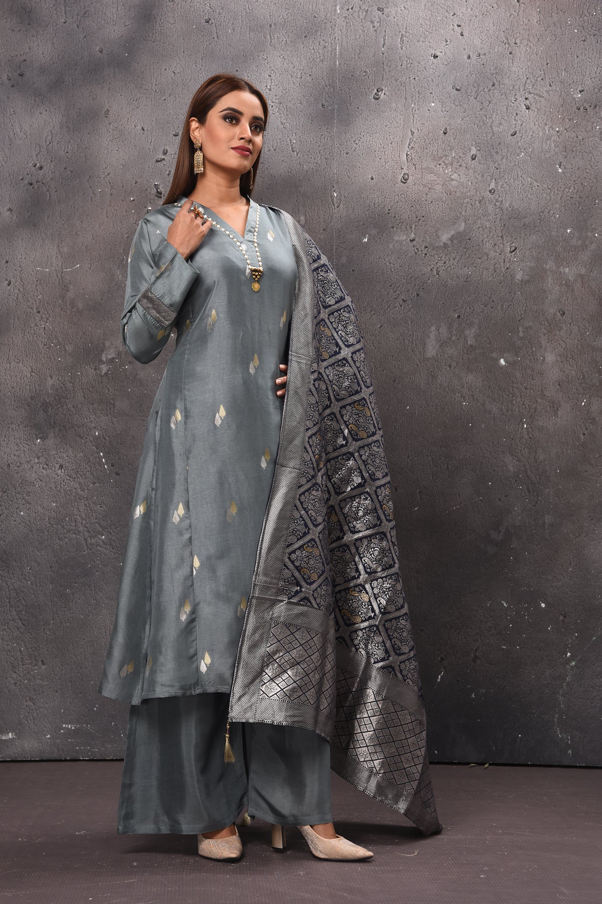 Shop stunning grey palazzo suit online in USA with matching dupatta. Get set for weddings and festive occasions in exclusive designer Anarkali suits, wedding gown, salwar suits, gharara suits, Indowestern dresses from Pure Elegance Indian fashion store in USA.-right