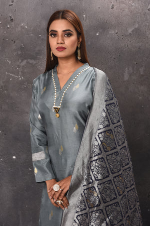 Shop stunning grey palazzo suit online in USA with matching dupatta. Get set for weddings and festive occasions in exclusive designer Anarkali suits, wedding gown, salwar suits, gharara suits, Indowestern dresses from Pure Elegance Indian fashion store in USA.-closeup