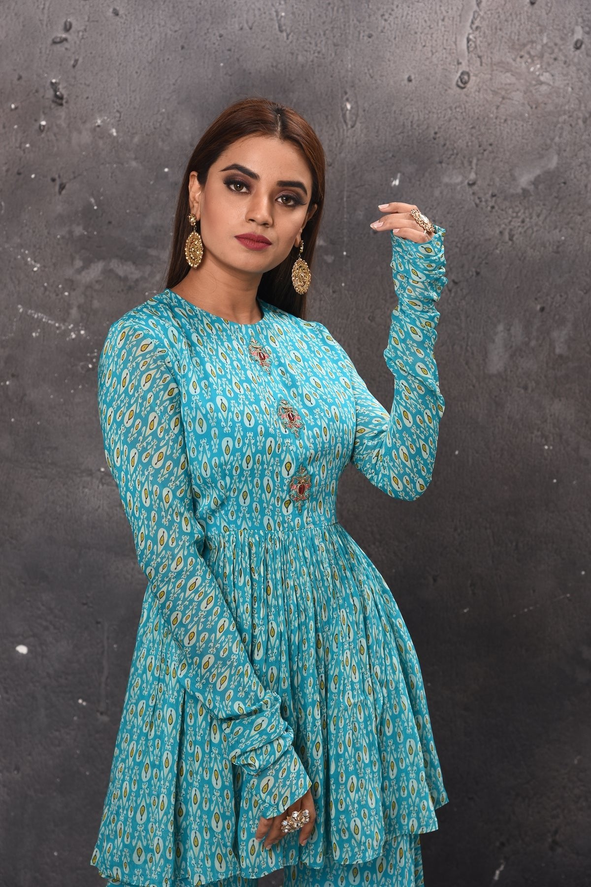 Buy stunning light blue gharara suit online in USA with matching dupatta. Get set for weddings and festive occasions in exclusive designer Anarkali suits, wedding gown, salwar suits, gharara suits, Indowestern dresses from Pure Elegance Indian fashion store in USA.-closeup