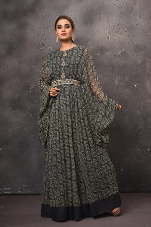 Buy stunning beautiful black printed maxi dress online in USA with bell sleeves. Get set for weddings and festive occasions in exclusive designer Anarkali suits, wedding gown, salwar suits, gharara suits, Indowestern dresses from Pure Elegance Indian fashion store in USA.-front