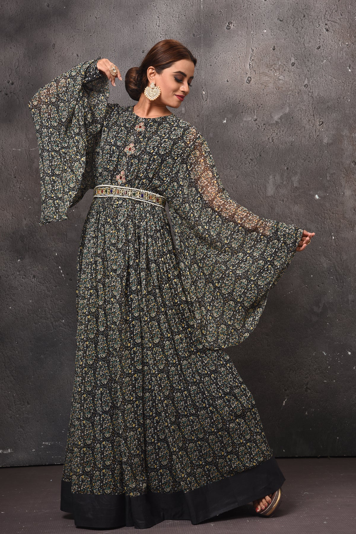Buy stunning beautiful black printed maxi dress online in USA with bell sleeves. Get set for weddings and festive occasions in exclusive designer Anarkali suits, wedding gown, salwar suits, gharara suits, Indowestern dresses from Pure Elegance Indian fashion store in USA.-sleeves