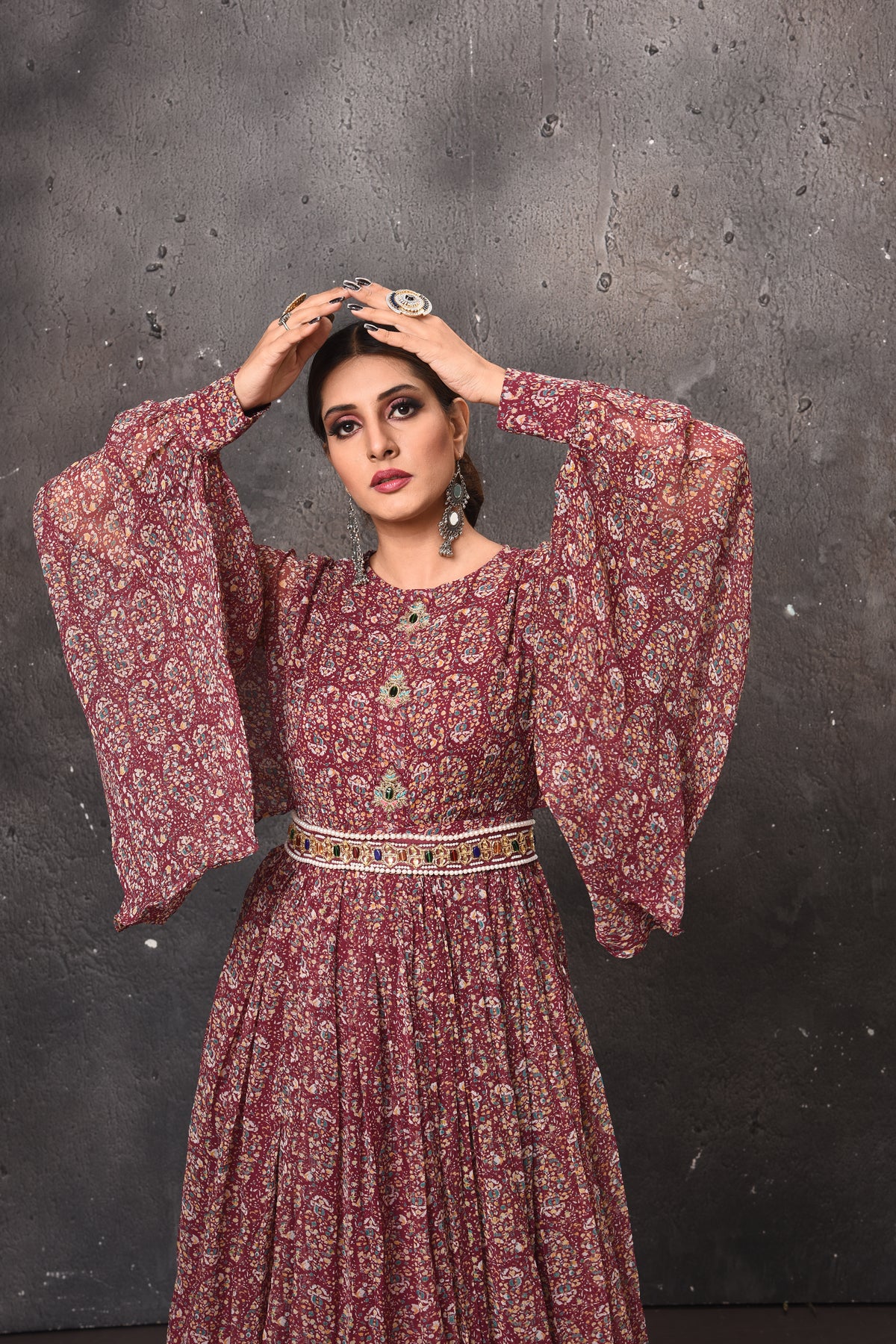 Shop gorgeous dark pink printed maxi dress online in USA with bell sleeves. Get set for weddings and festive occasions in exclusive designer Anarkali suits, wedding gown, salwar suits, gharara suits, Indowestern dresses from Pure Elegance Indian fashion store in USA.-closeup