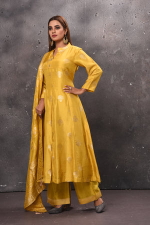 Buy elegant yellow palazzo suit online in USA with dupatta. Get set for weddings and festive occasions in exclusive designer Anarkali suits, wedding gown, salwar suits, gharara suits, Indowestern dresses from Pure Elegance Indian fashion store in USA.-side