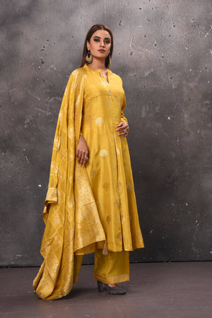 Buy elegant yellow palazzo suit online in USA with dupatta. Get set for weddings and festive occasions in exclusive designer Anarkali suits, wedding gown, salwar suits, gharara suits, Indowestern dresses from Pure Elegance Indian fashion store in USA.-right