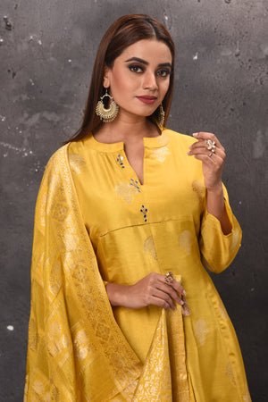 Buy elegant yellow palazzo suit online in USA with dupatta. Get set for weddings and festive occasions in exclusive designer Anarkali suits, wedding gown, salwar suits, gharara suits, Indowestern dresses from Pure Elegance Indian fashion store in USA.-closeup