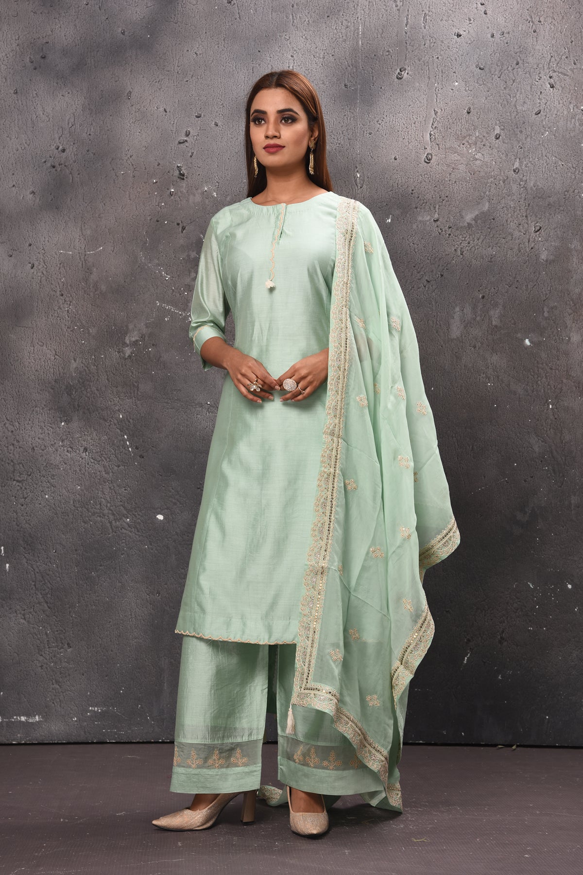 Shop stunning mint green palazzo suit online in USA with matching dupatta. Get set for weddings and festive occasions in exclusive designer Anarkali suits, wedding gown, salwar suits, gharara suits, Indowestern dresses from Pure Elegance Indian fashion store in USA.-full view