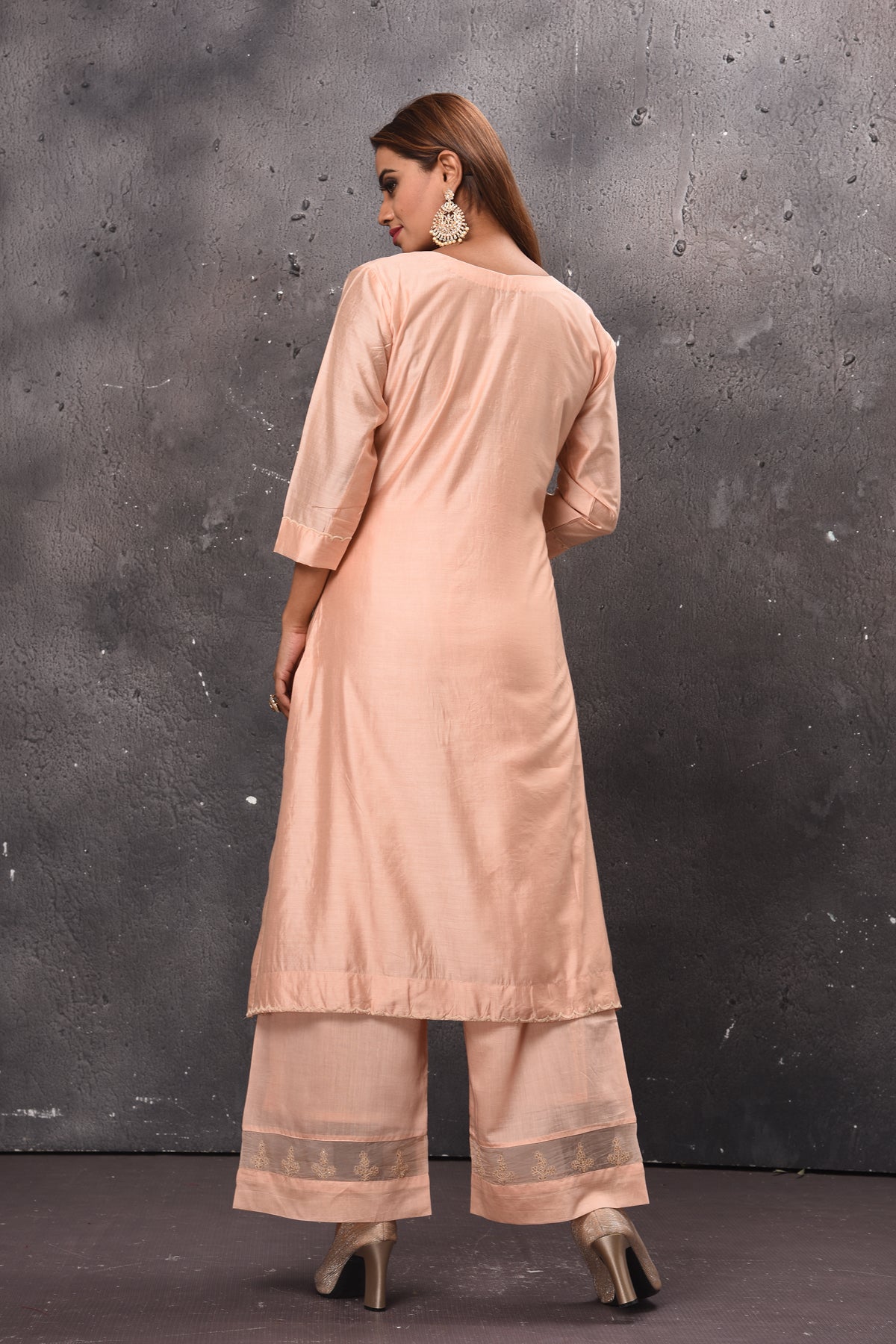 Shop beautiful light peach palazzo suit online in USA with matching dupatta. Get set for weddings and festive occasions in exclusive designer Anarkali suits, wedding gown, salwar suits, gharara suits, Indowestern dresses from Pure Elegance Indian fashion store in USA.-back