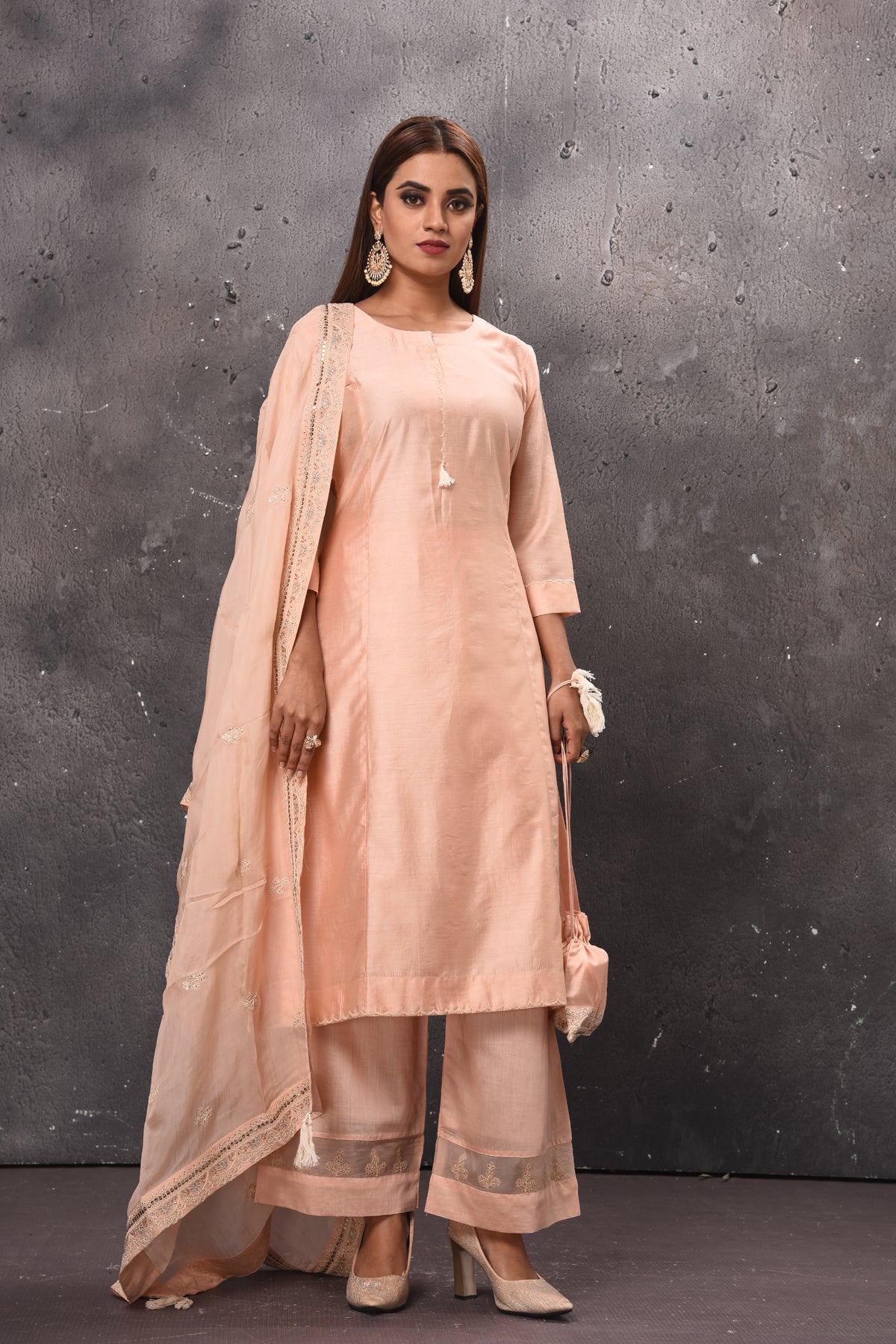 Shop beautiful light peach palazzo suit online in USA with matching dupatta. Get set for weddings and festive occasions in exclusive designer Anarkali suits, wedding gown, salwar suits, gharara suits, Indowestern dresses from Pure Elegance Indian fashion store in USA.-full view