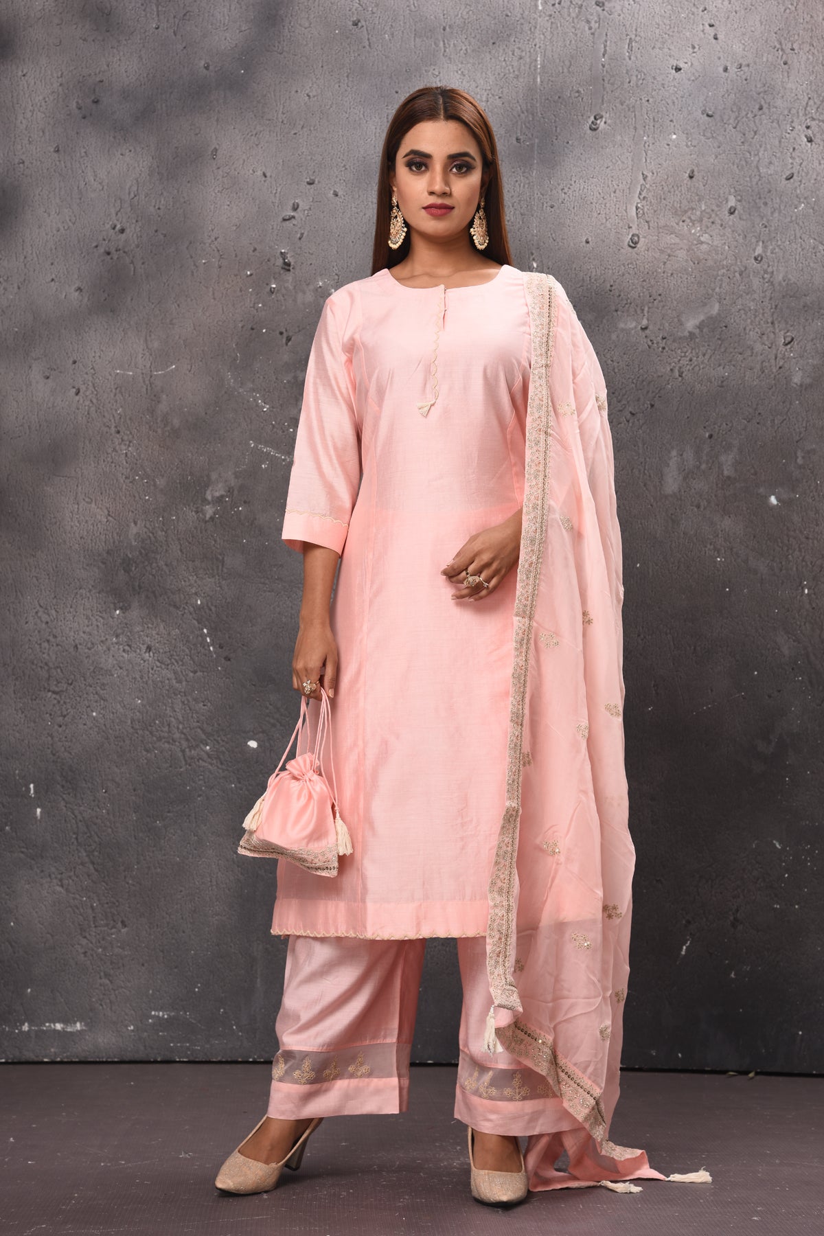 Shop elegant light pink palazzo suit online in USA with matching dupatta. Get set for weddings and festive occasions in exclusive designer Anarkali suits, wedding gown, salwar suits, gharara suits, Indowestern dresses from Pure Elegance Indian fashion store in USA.-full view