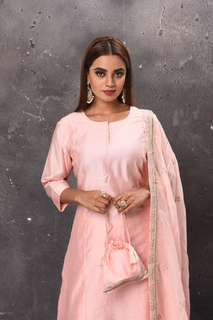 Shop elegant light pink palazzo suit online in USA with matching dupatta. Get set for weddings and festive occasions in exclusive designer Anarkali suits, wedding gown, salwar suits, gharara suits, Indowestern dresses from Pure Elegance Indian fashion store in USA.-closeup