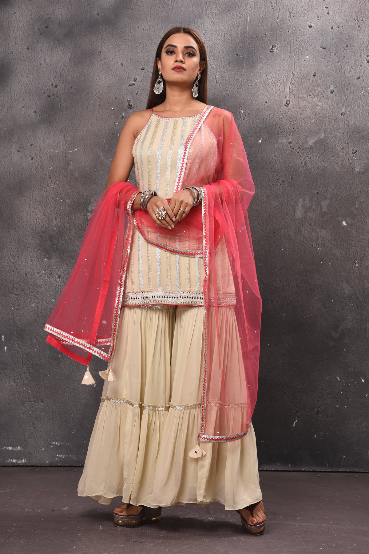 Buy light yellow embellished sharara suit online in USA with pink dupatta. Get set for weddings and festive occasions in exclusive designer Anarkali suits, wedding gown, salwar suits, gharara suits, Indowestern dresses from Pure Elegance Indian fashion store in USA.-full view