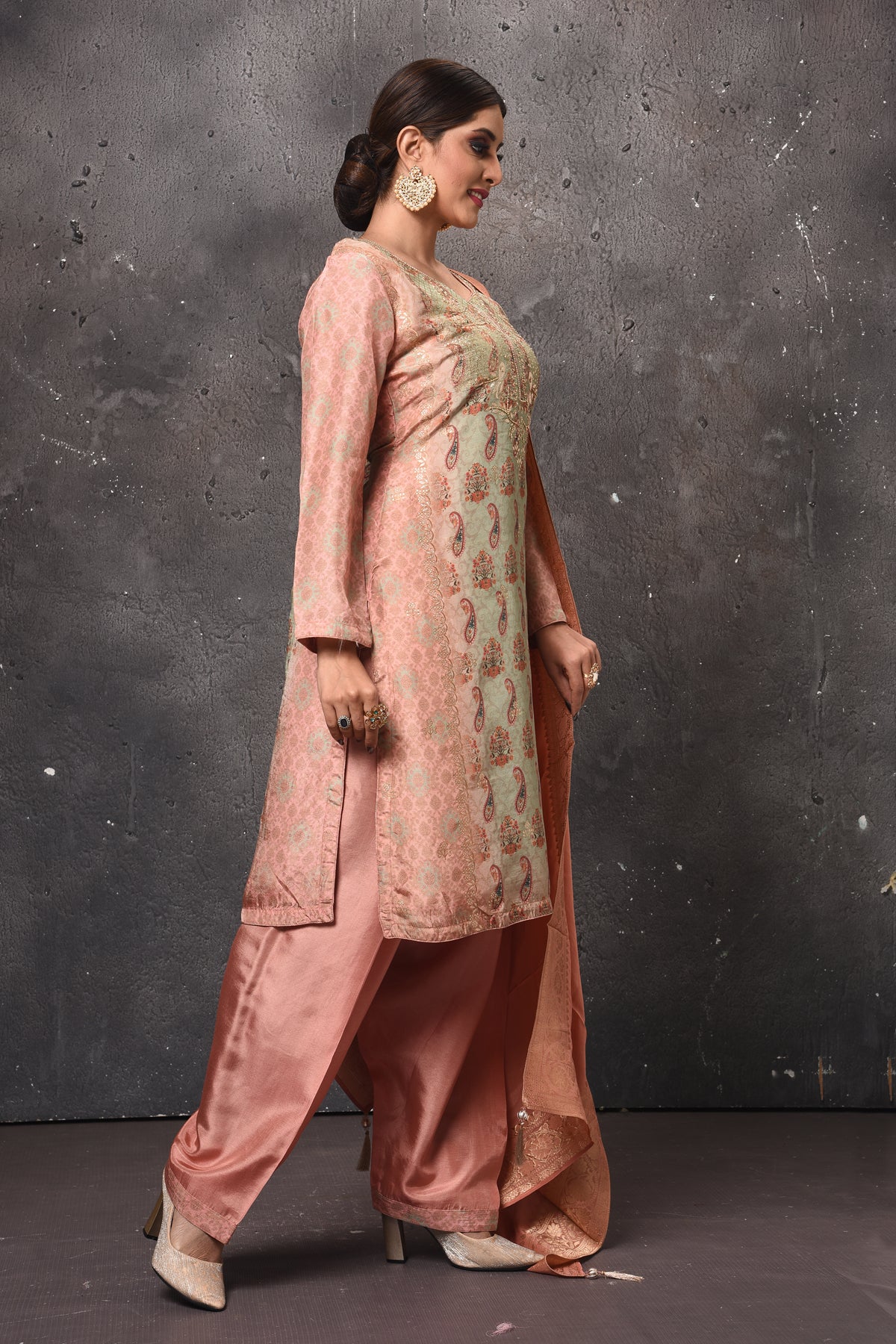 Shop stunning pista green and peach embroidered salwar suit online in USA with dupatta. Get set for weddings and festive occasions in exclusive designer Anarkali suits, wedding gown, salwar suits, gharara suits, Indowestern dresses from Pure Elegance Indian fashion store in USA.-right